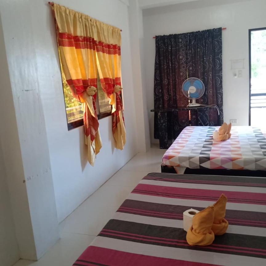 Chelle'S Apartelle-Inn El Nido Exterior foto