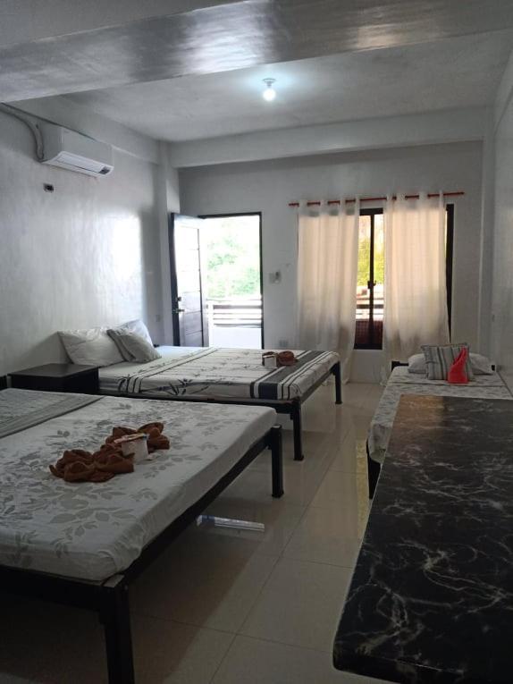 Chelle'S Apartelle-Inn El Nido Exterior foto